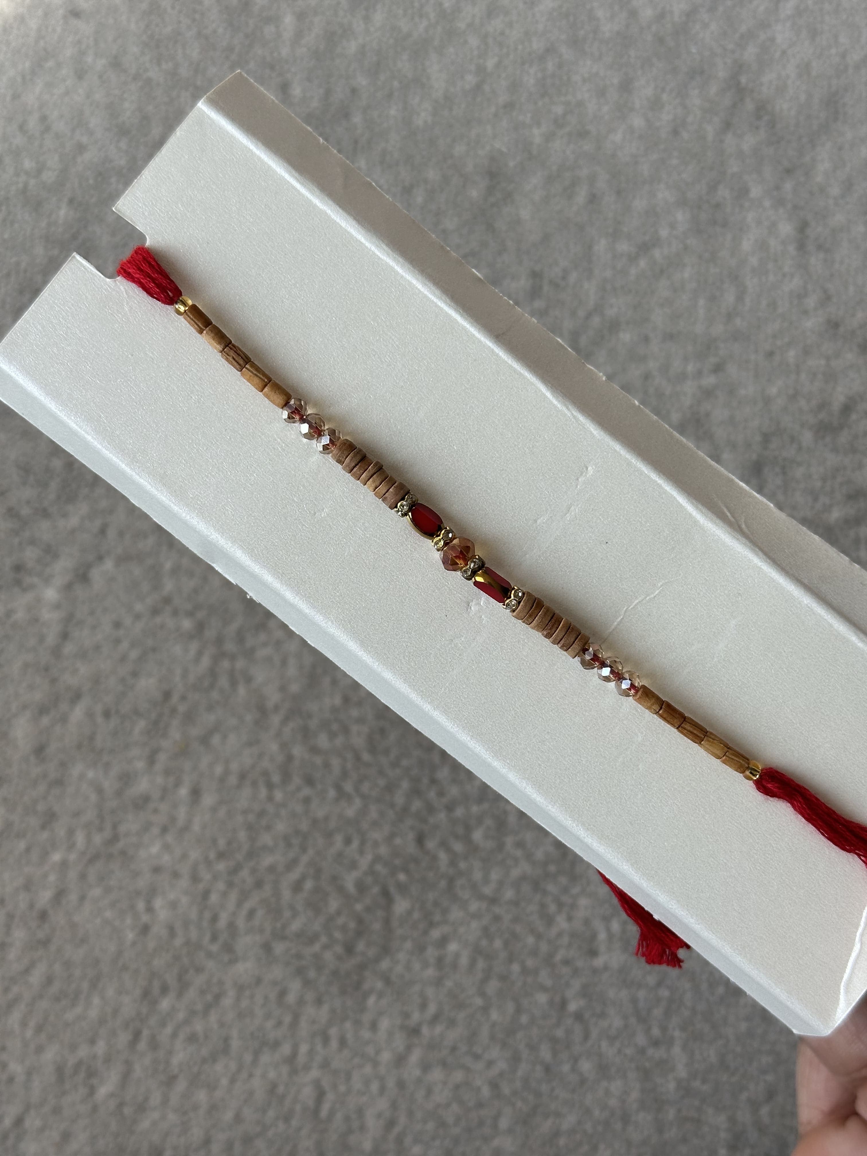 Earth Tone Rakhi with Wooden Discs